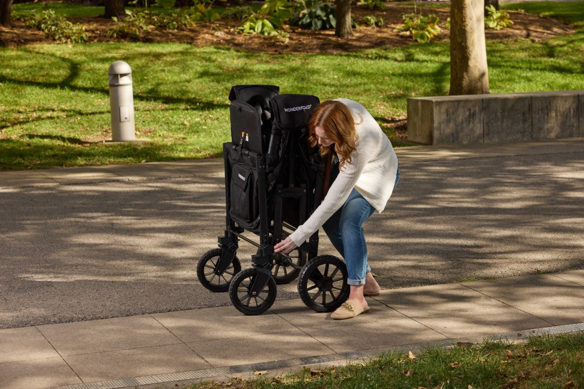 Mom easliy folds W4 Luxe Pro Jet Black Stroller Wagon